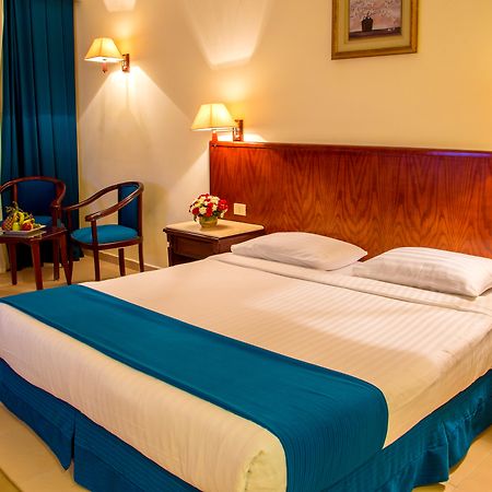 Serenity Alpha Beach - Ex Serenity Makadi Beach Екстериор снимка A bedroom in a hotel